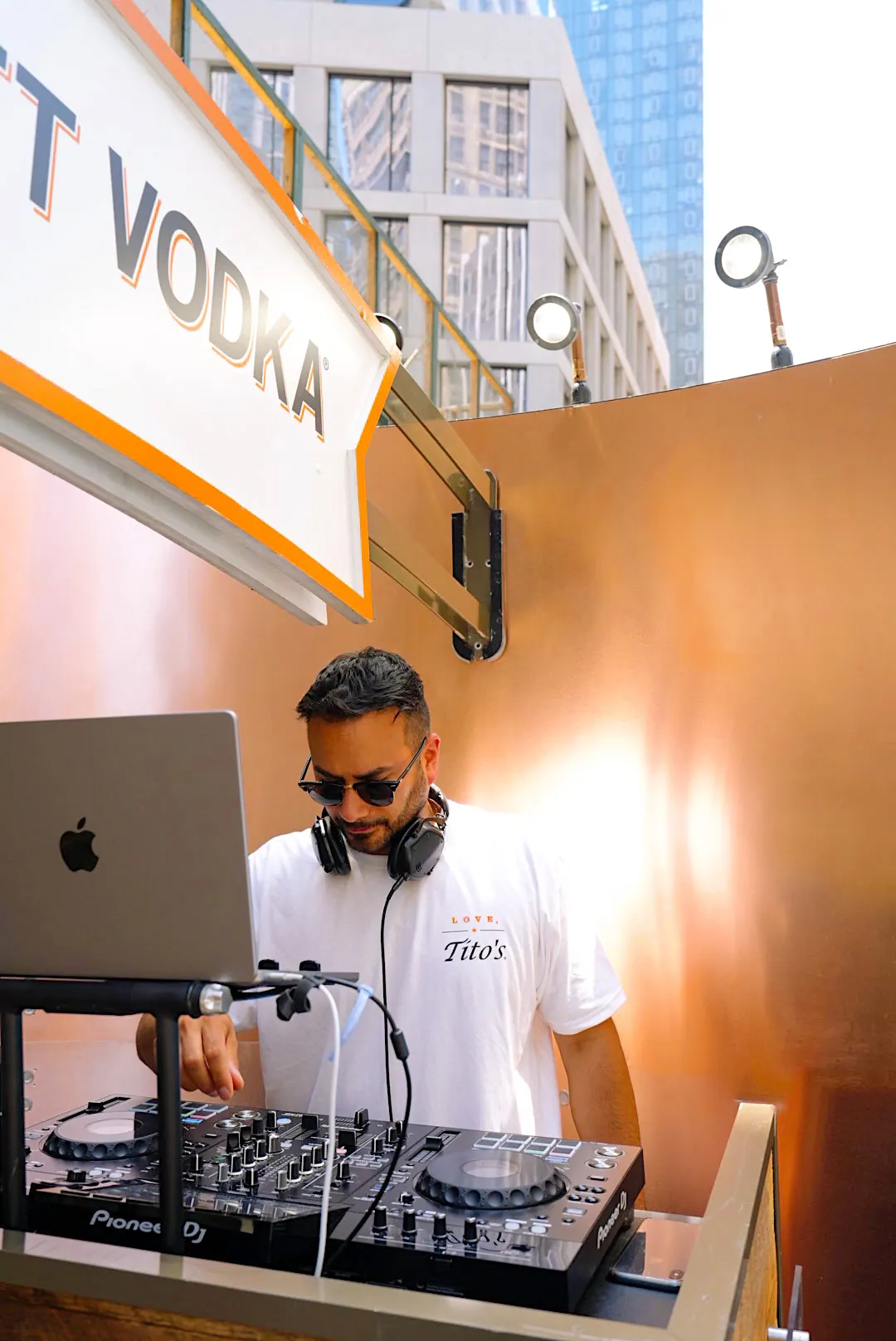 DJ Jay Nyce playing at the Tito's Vodka float booth